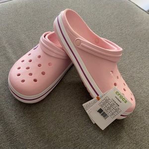 Crocs size 9 men 11 women’s. Pink. Never worn. No box